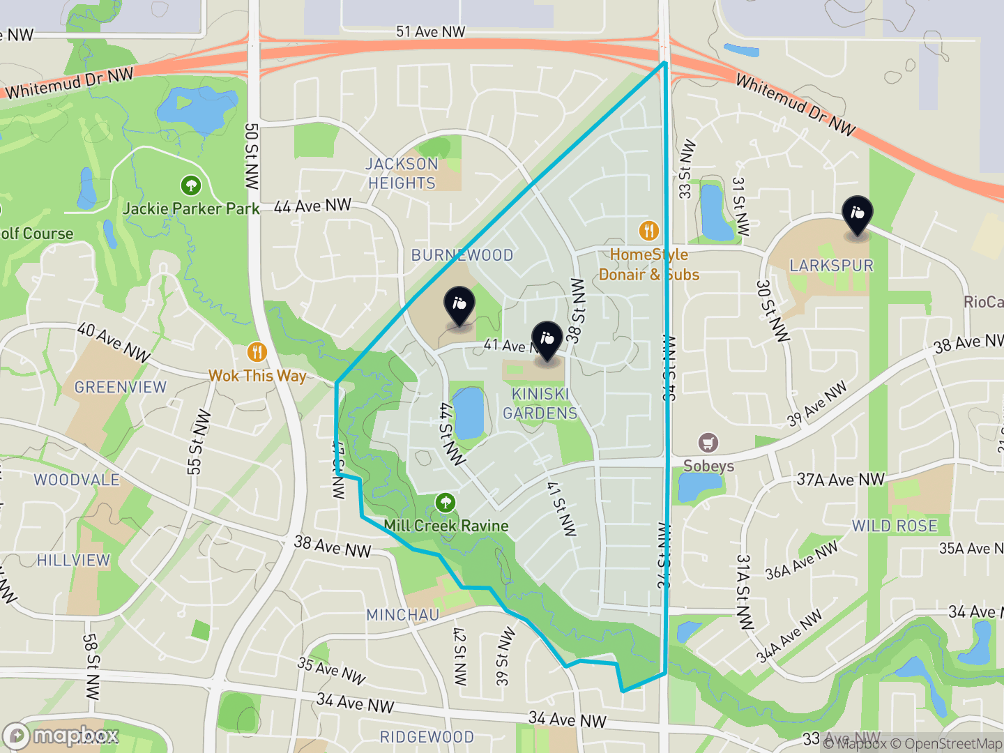 Map of Kiniski Gardens, Edmonton — neighbourhood boundary, 3 schools, parks and surrounding streets.