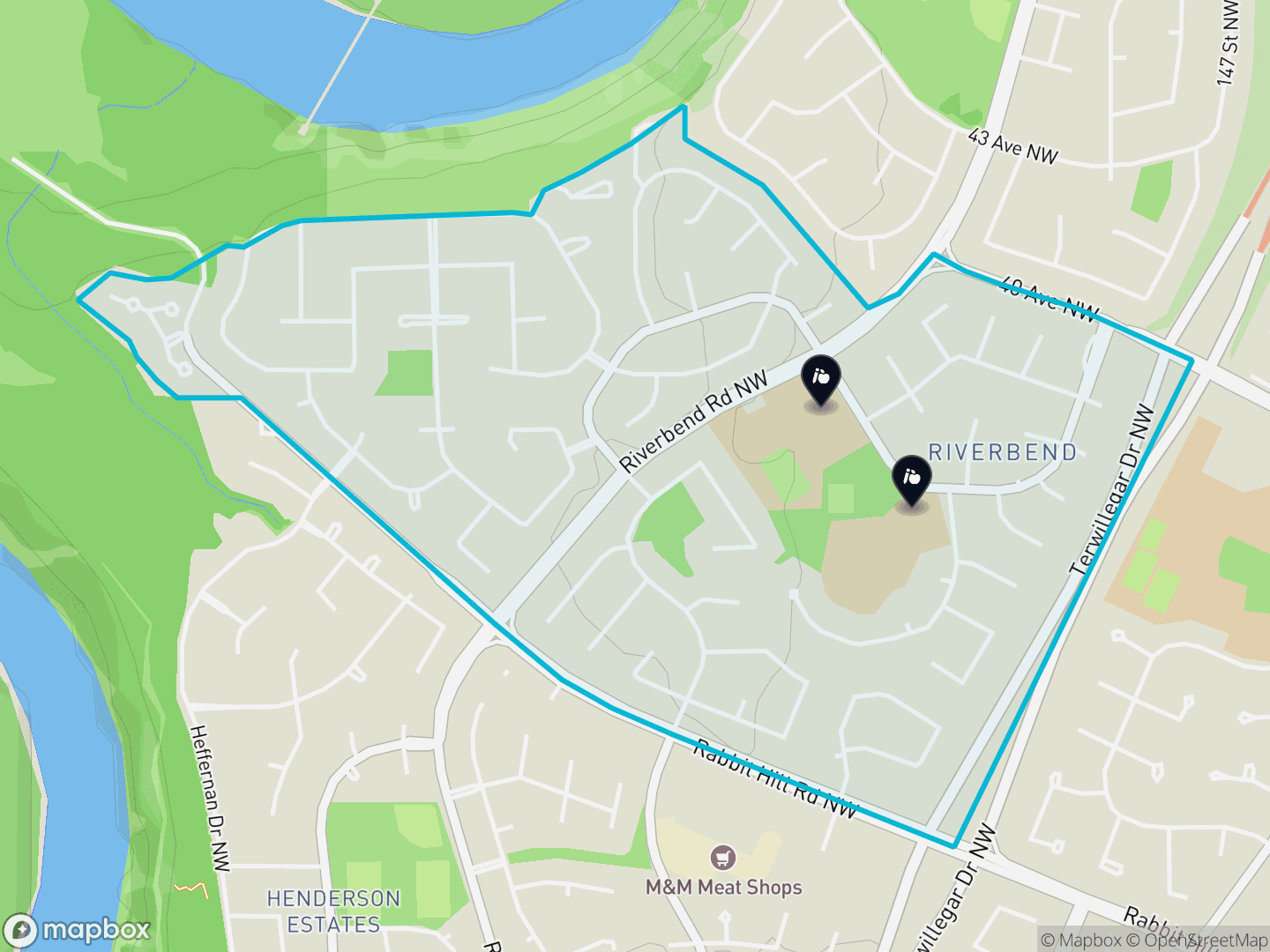 Map of Rhatigan Ridge, Edmonton — neighbourhood boundary, 2 schools, parks and surrounding streets.